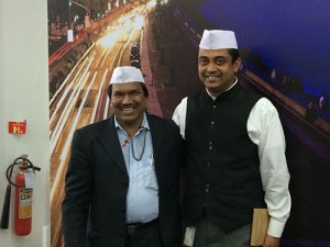 Sunder Madakshira hosting Dr. Pavan Agarwal, Chairman of the Mumbai Dabbawallah Education Association for the Leadership Talk Series at SAP Labs India on 10 July 2014. Seen in the pic with the trademark Gandhi topi with Dr. Agarwal. He share valuable less